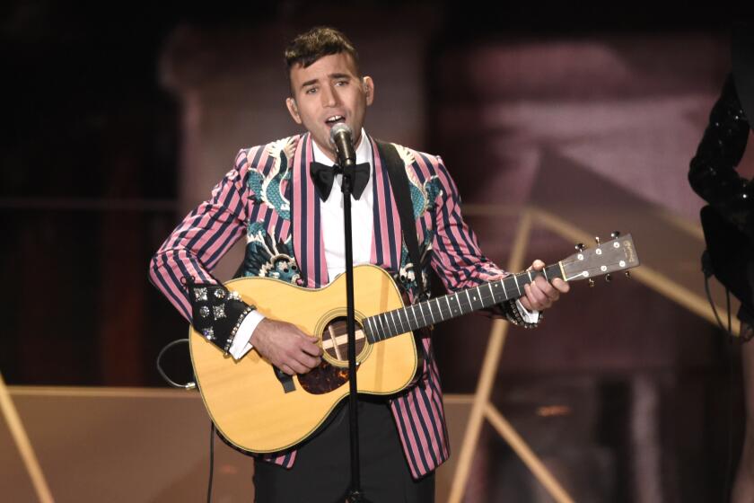 Sufjan Stevens performs "Mystery of Love" from the film "Call Me By Your Name" at the Oscars on Sunday, March 4, 2018, at the Dolby Theatre in Los Angeles. (Photo by Chris Pizzello/Invision/AP)