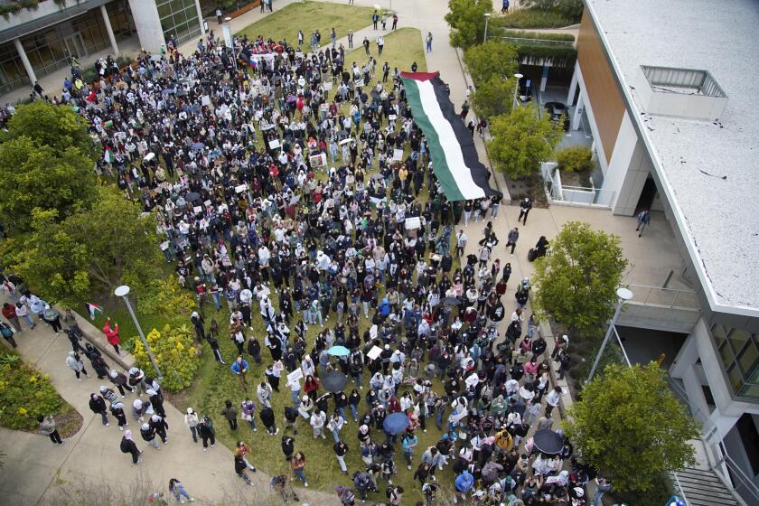 San Diego, California - March 06: Students for Justice in Palestine at UC San Diego held a rally in attempt to pressure UCSD to divest from interests favorable to Israel. Hundreds gathered on campus and participated in a march in La Jolla on Wednesday, March 6, 2024 in San Diego, California. (Alejandro Tamayo / The San Diego Union-Tribune)