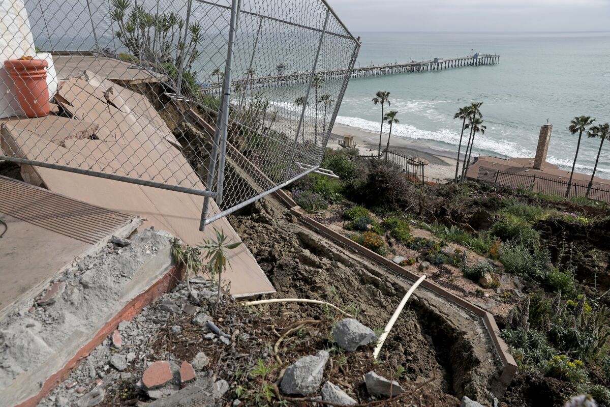 A landslide damaged the historic Casa Romantica cultural center in San Clemente, sending debris down the bluff.