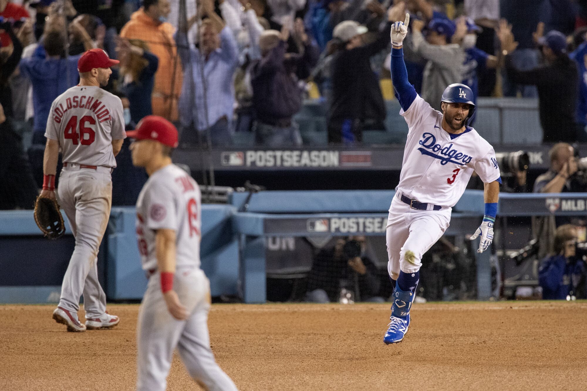 Chris Taylor reacts while running the bases after his walkoff home run.