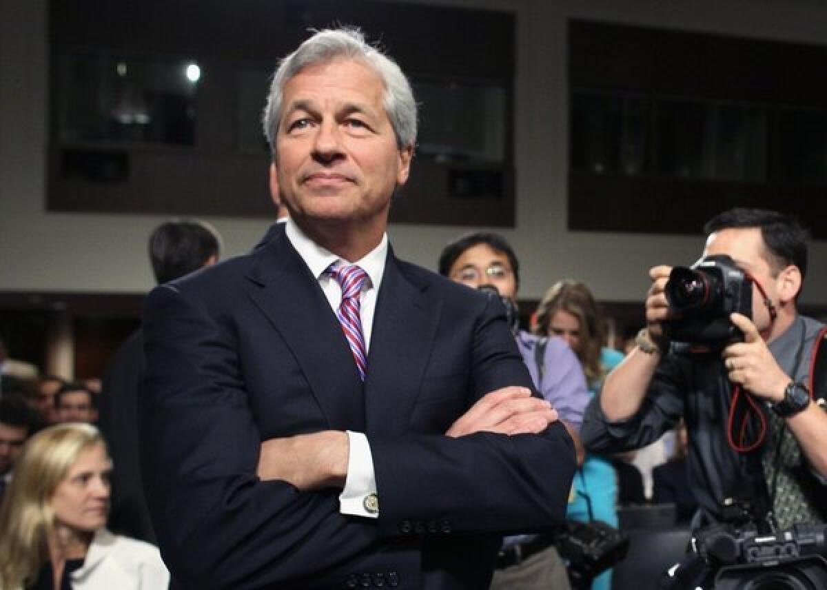 Still riding high: JPMorgan Chairman and CEO Jamie Dimon, unfazed by a $13-billion hit.