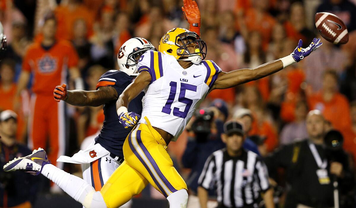 Although the College Football Playoffs is out of reach for wide receiver Malachi Dupre (15) and two-loss Louisiana State, in part because of a 41-7 defeat to one-loss Auburn and defensive back Jonathon Mincy, both schools can still figure prominently in sorting out the SEC race.