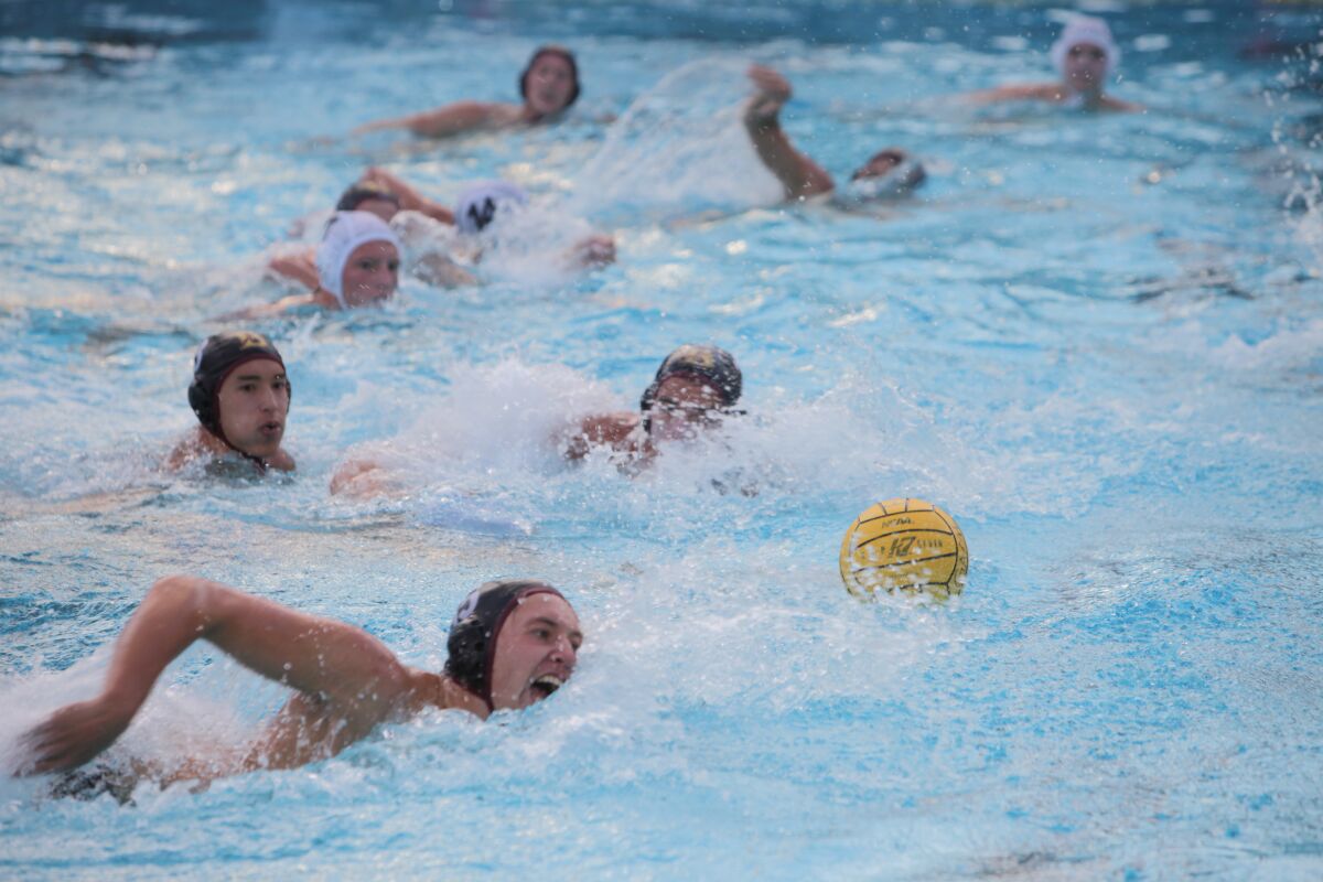 La Jolla and Bishop's players battle for the ball during their Sept. 30 game. Bishop's won then and again Oct. 12.