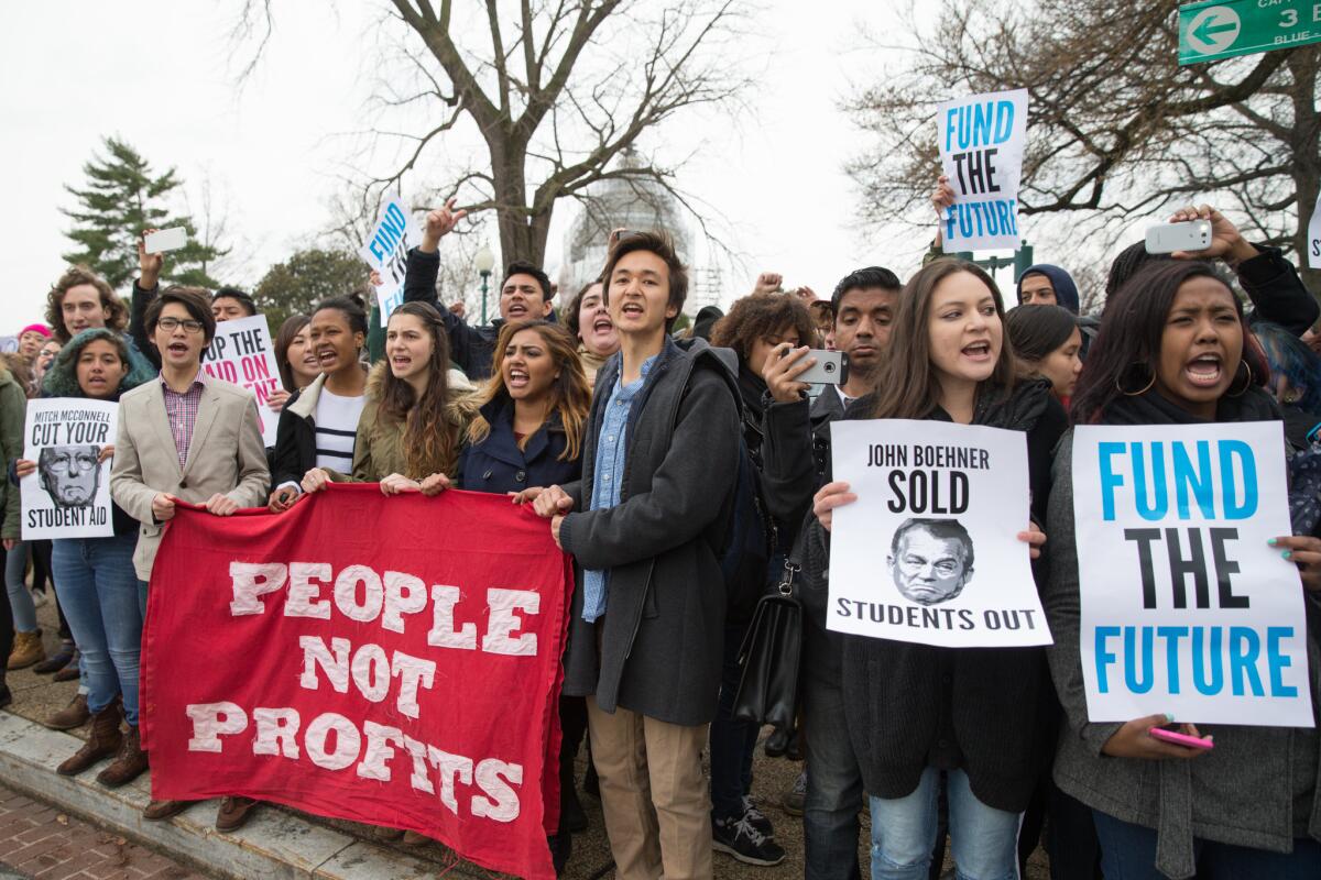 Students gather near the Capitol and Supreme Court on Friday, March 27 during a demonstration to protest against cuts to student aid in the proposed federal budget.