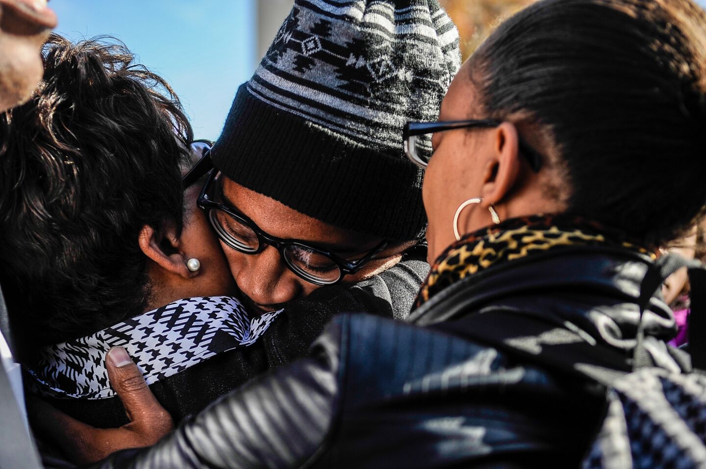 University of Missouri graduate student Jonathan Butler embraces his mother just moments after University of Missouri President Tim Wolfe announced his resignation. Butler held a hunger strike, saying he would not eat until Wolfe resigned.