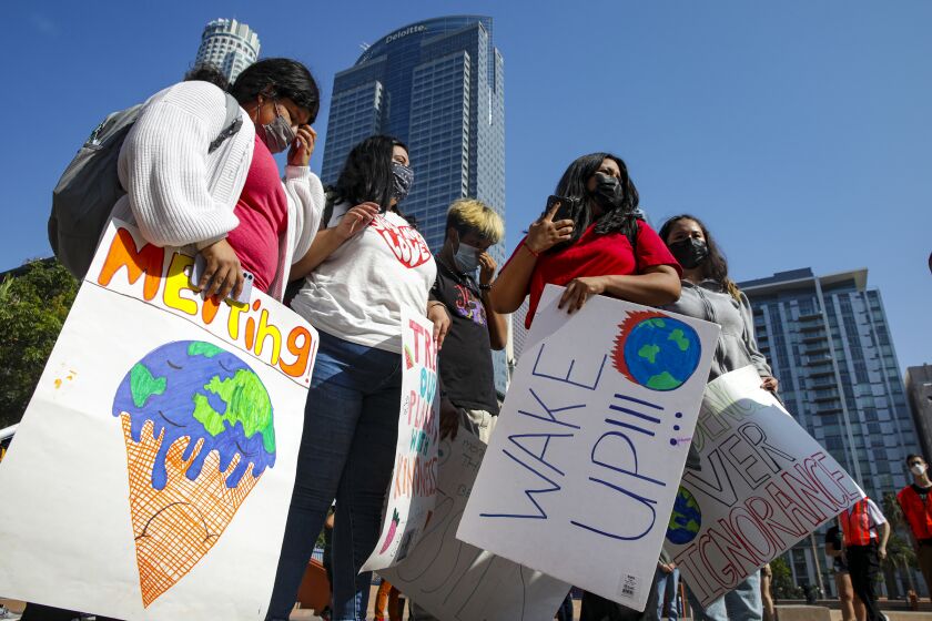 Los Angeles, CA - September 24: Students from Alliance Leichtman Levine Family Foundation Environmental Science High School as part of the global strikes to demand climate action rally at Pershing Square on Friday, Sept. 24, 2021 in Los Angeles, CA. (Irfan Khan / Los Angeles Times)
