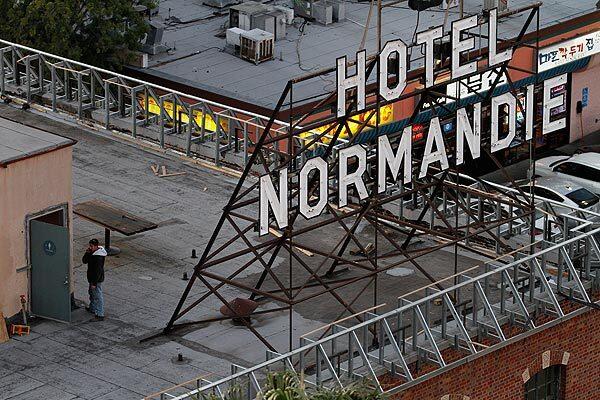 Hotel Normandie, a 1920s relic in L.A.'s Koreatown, has been purchased by architect Jingbo Lou, who expects to reopen it as a boutique hotel by the end of 2012.