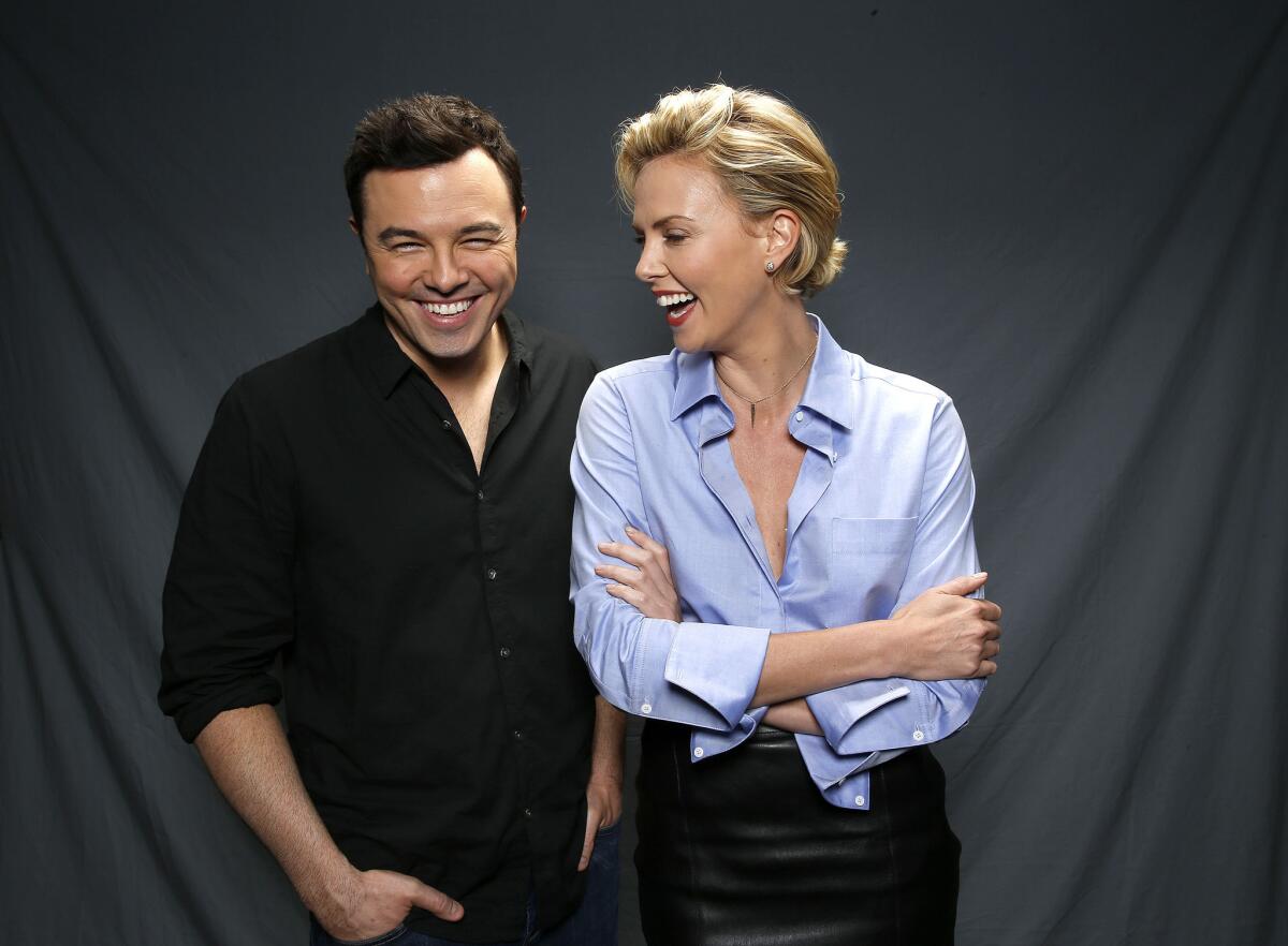 Seth MacFarlane and Charlize Theron star in "A Million Ways to Die in the West."