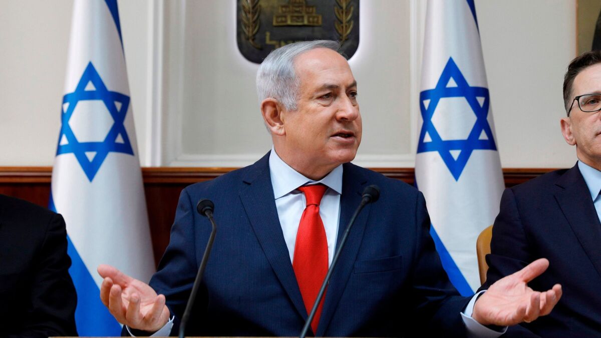 Israeli Prime Minister Benjamin Netanyahu opens the weekly Cabinet meeting at his Jerusalem office on Jan. 21, 2018.