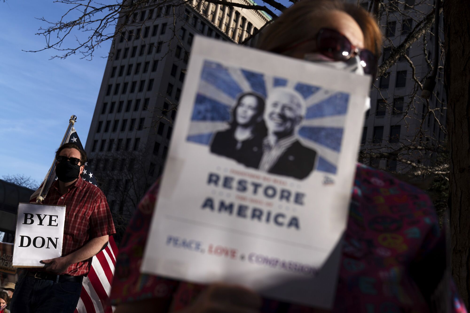 Joe Biden supporters celebrate the election results at a rally in Detroit