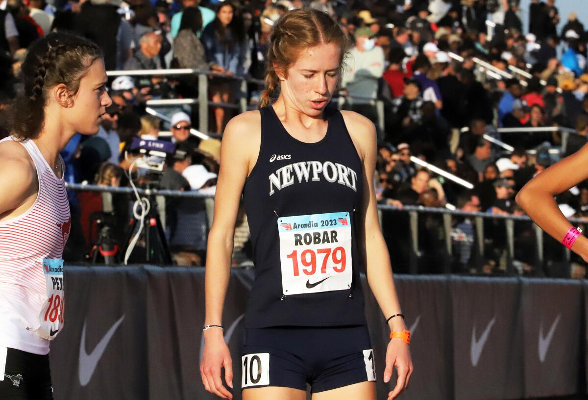 Newport Harbor's Keaton Robar takes a deep breath before she competes in the 800 meters on Saturday at Arcadia High.