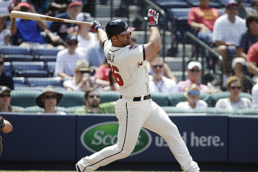 Dan Uggla was called up to start at second base for the San Francisco Giants on Friday just four days after signing a minor league contract with the team following his release by the Atlanta Braves.