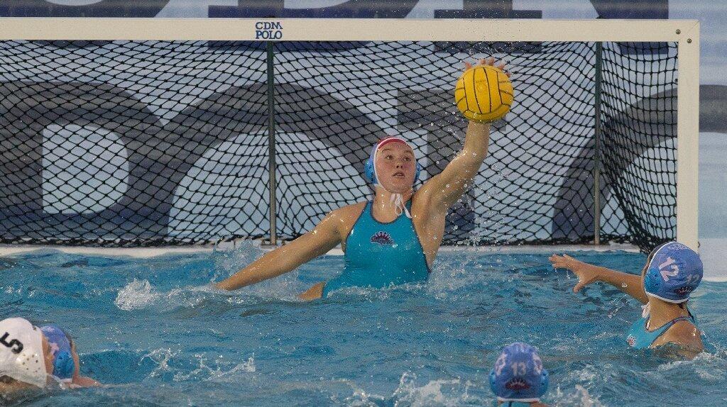 Corona del Mar High goalie Erin Tharp makes a save during the second half against Newport Harbor.