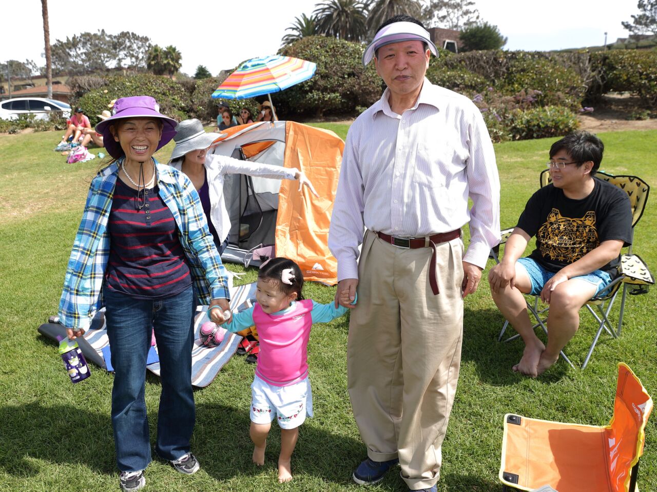 The Tian family enjoys the Del Mar Foundation picnic