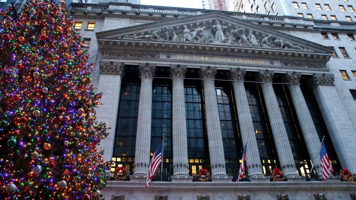 Christmas decorations adorn the facade of the New York Stock Exchange in December 2017.
