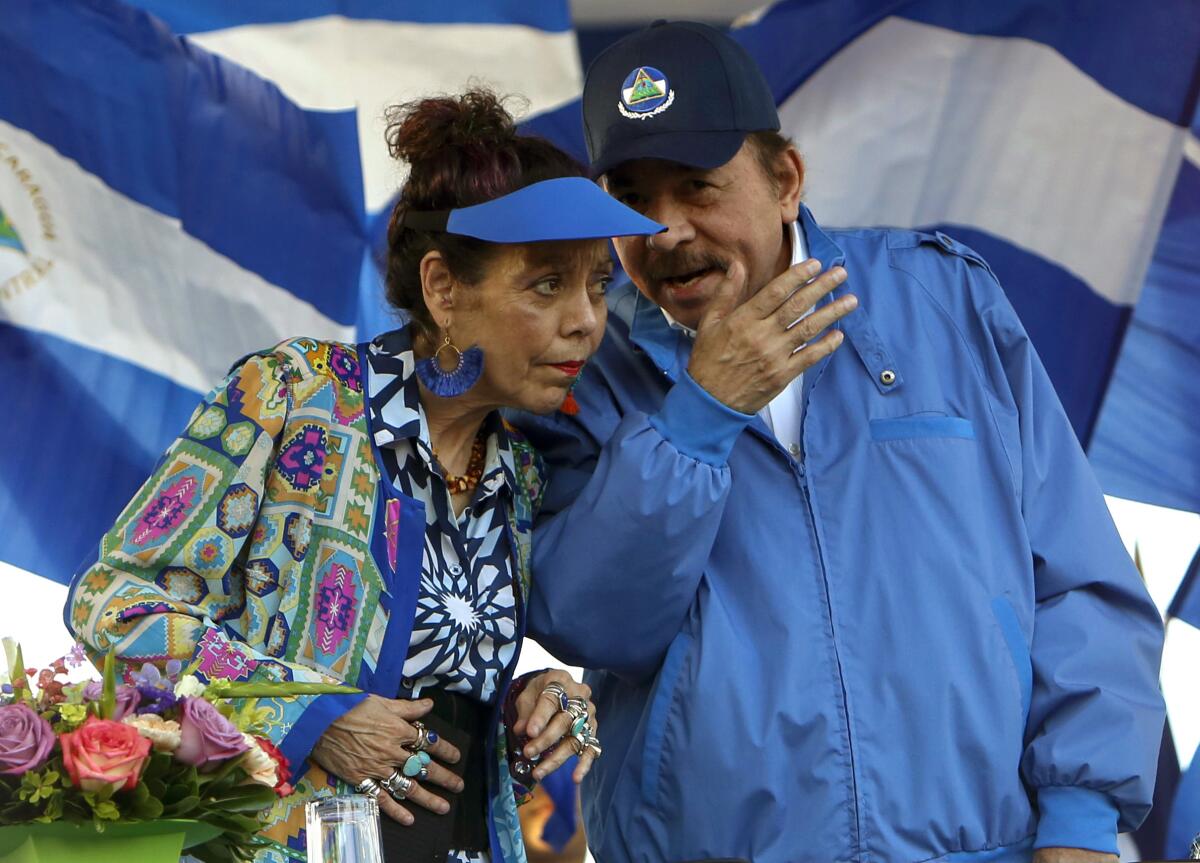 Nicaraguan President Daniel Ortega and his wife, Vice President Rosario Murillo, at an outdoor rally