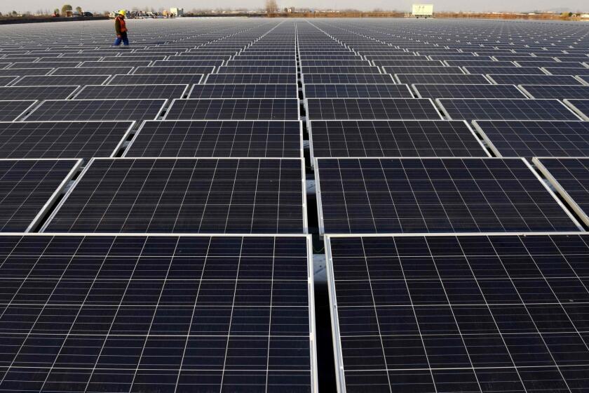 TOPSHOT - This photo taken on December 11, 2017 shows a general view of a floating solar power plant in Huainan, a former coal-mining region, in China's eastern Anhui province. / AFP PHOTO / - / China OUT-/AFP/Getty Images ** OUTS - ELSENT, FPG, CM - OUTS * NM, PH, VA if sourced by CT, LA or MoD **
