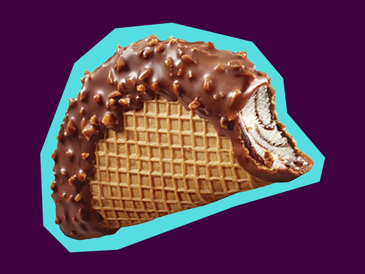 A Choco Taco with a bite taken out of it