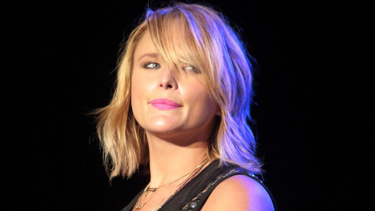 Miranda Lambert is saying she's been "living off caffeine and sad songs" lately. The singer, shown on stage in Delaware last month, just split from Blake Shelton after four years of marriage.