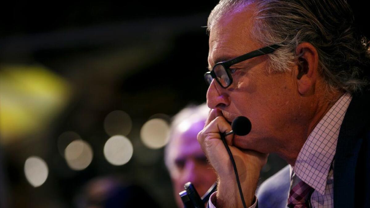 Mike Pereira watches a football game inside the officiating command center at the Fox studios in Los Angeles on Nov. 20.