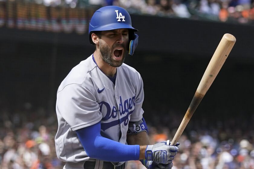 Los Angeles Dodgers' Chris Taylor reacts after striking out during the eighth inning.