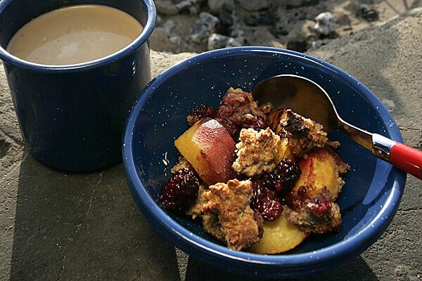 This is the dessert to make on your next camping trip. Recipe: Peach, blackberry and almond crisp