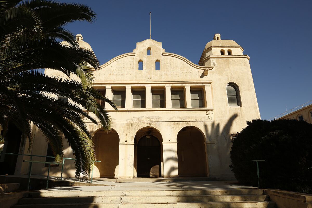 An exterior view of a building with arches