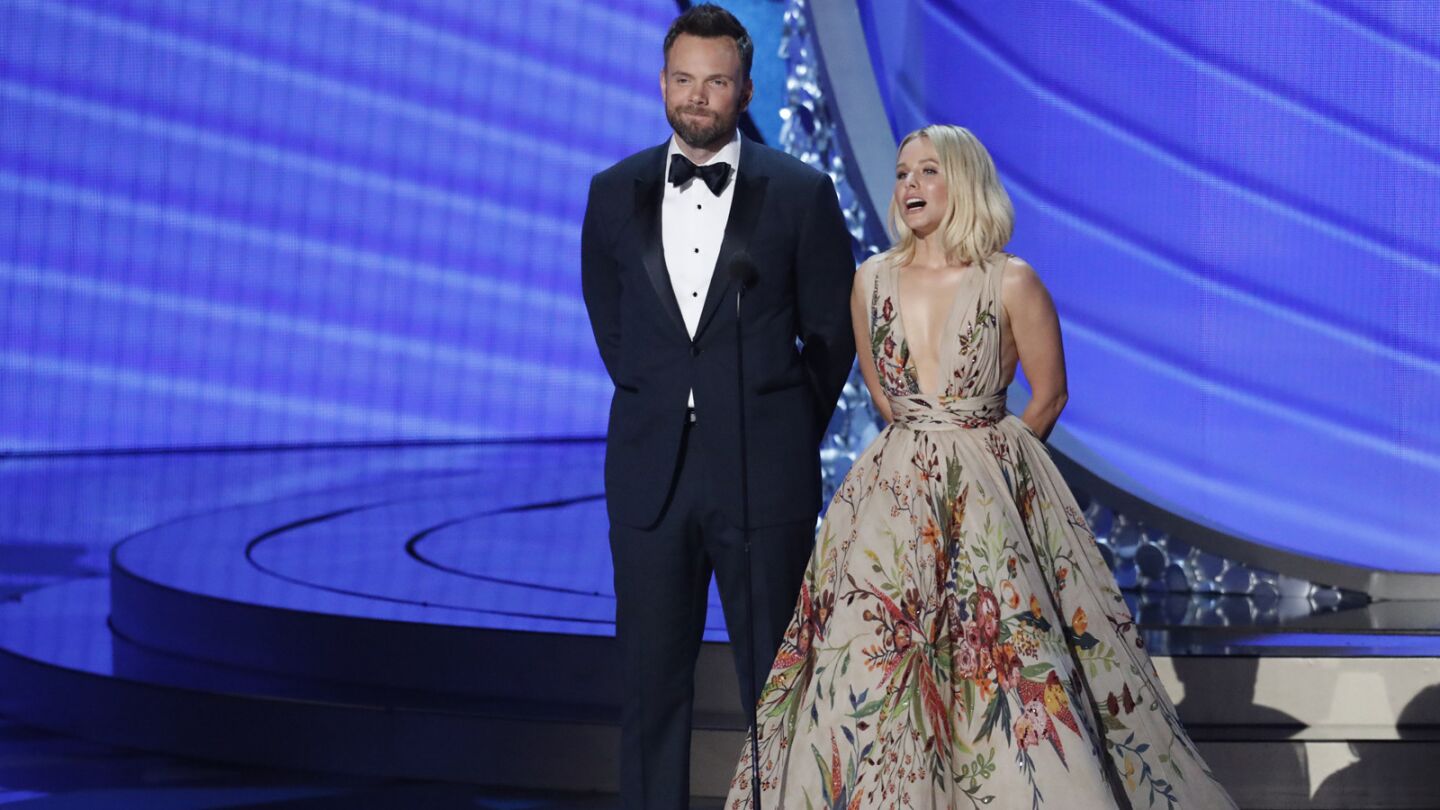 "Difficult People" actor Joel McHale and "The Good Place" actress Kristen Bell present the award for supporting actress in a comedy.