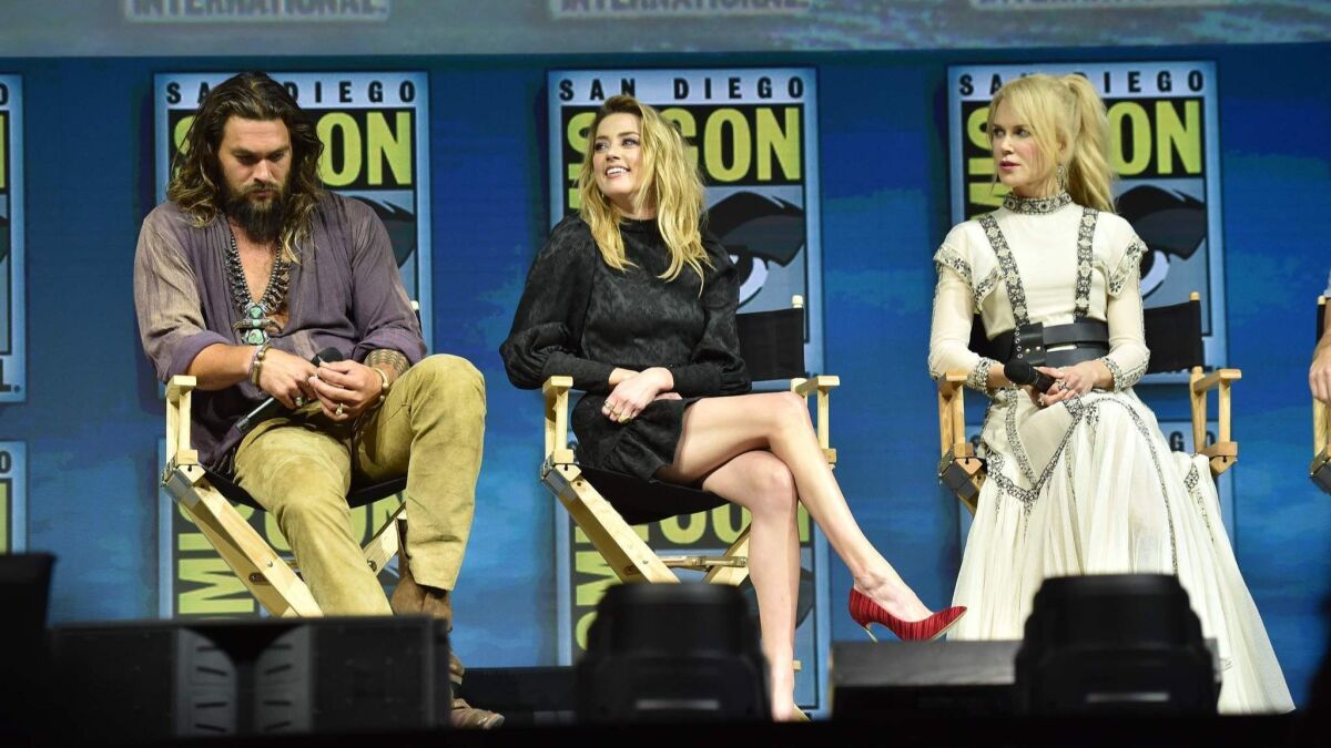 Jason Momoa, left, Amber Heard and Nicole Kidman in the Comic-Con panel for "Aquaman."