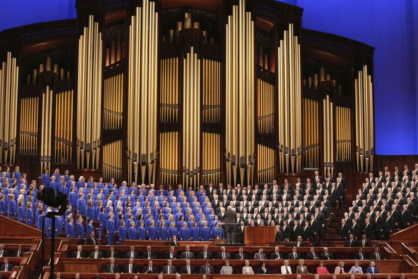 FILE - In this March 31, 2018, file photo, The Mormon Tabernacle Choir perform during the twice-annual conference of The Church of Jesus Christ of Latter-day Saints, in Salt Lake City. The well-known Mormon Tabernacle Choir was renamed Friday, Oct. 5, 2018, to strip out the word Mormon in a move showing the faith's new president is serious about ending shorthand names for the religion that have been used for generations by church members and previously promoted by the church. The gospel singing group will now be called "The Tabernacle Choir at Temple Square," The Church of Jesus Christ of Latter-day Saints said in a statement. (AP Photo/Rick Bowmer, File)