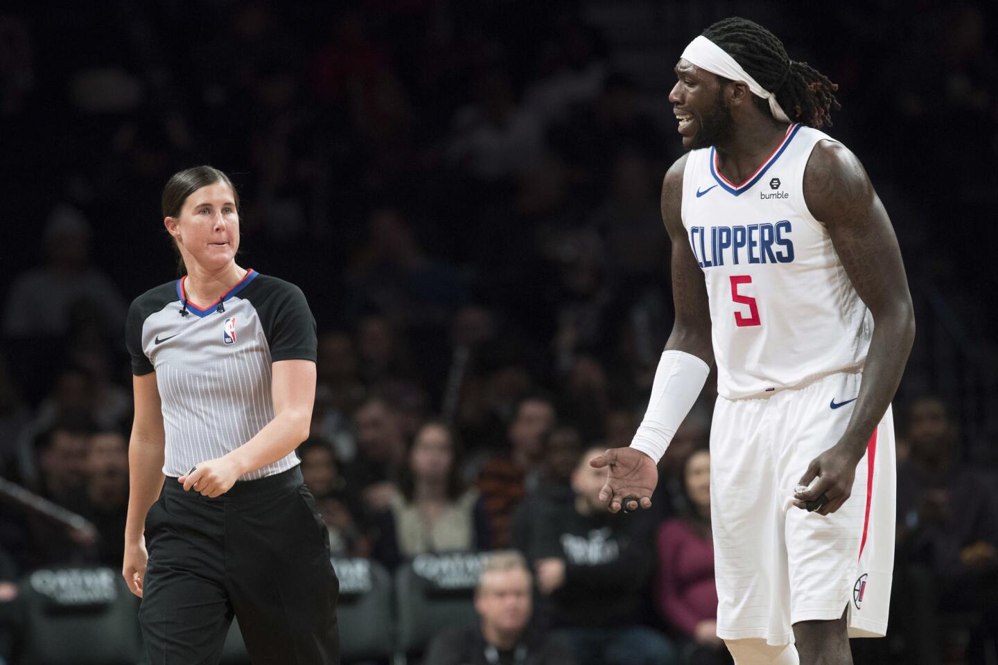 Los Angeles Clippers forward Montrezl Harrell (5) argues with referee Natalie Sago during the second half of an NBA basketball game, Saturday, Nov. 17, 2018, in New York. The Clippers won 127-119. (AP Photo/Mary Altaffer)