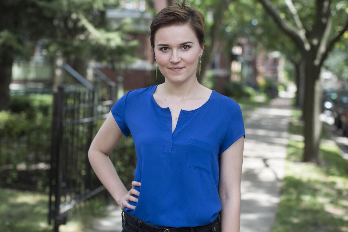 Veronica Roth poses for a photo in Chicago, the setting for her YA dystopian "Divergent" trilogy, which comes to an end with "Allegiant."