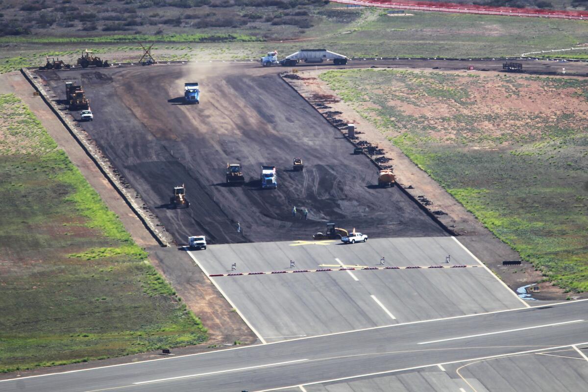 SAN DIEGO, CA-OCTOBER 7, 2015 | Construction work is done to repave a runway at Montgomery Field. | (K.C. Alfred/ San Diego Union-Tribune