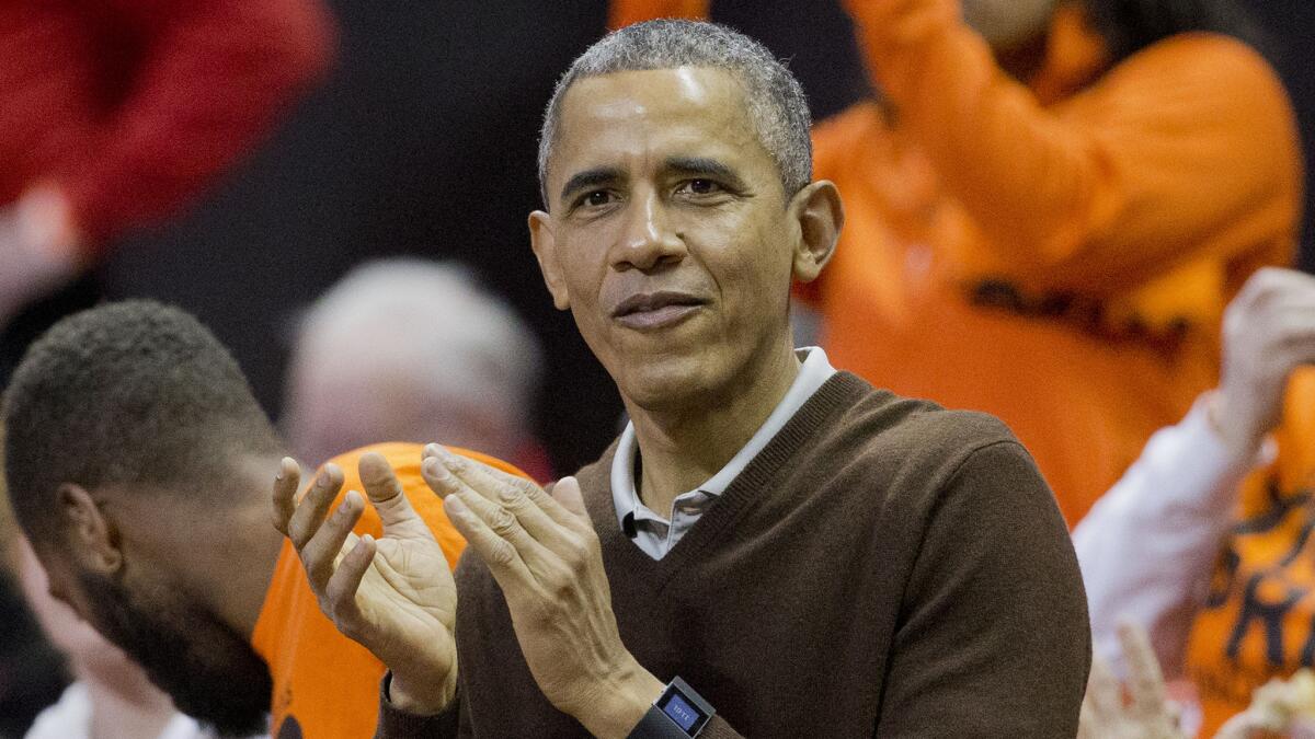 President Obama attends an NCAA women's basketball tournament game between Princeton and Wisconsin-Green Bay on Saturday. Obama's niece, Leslie Robinson, plays for Princeton.