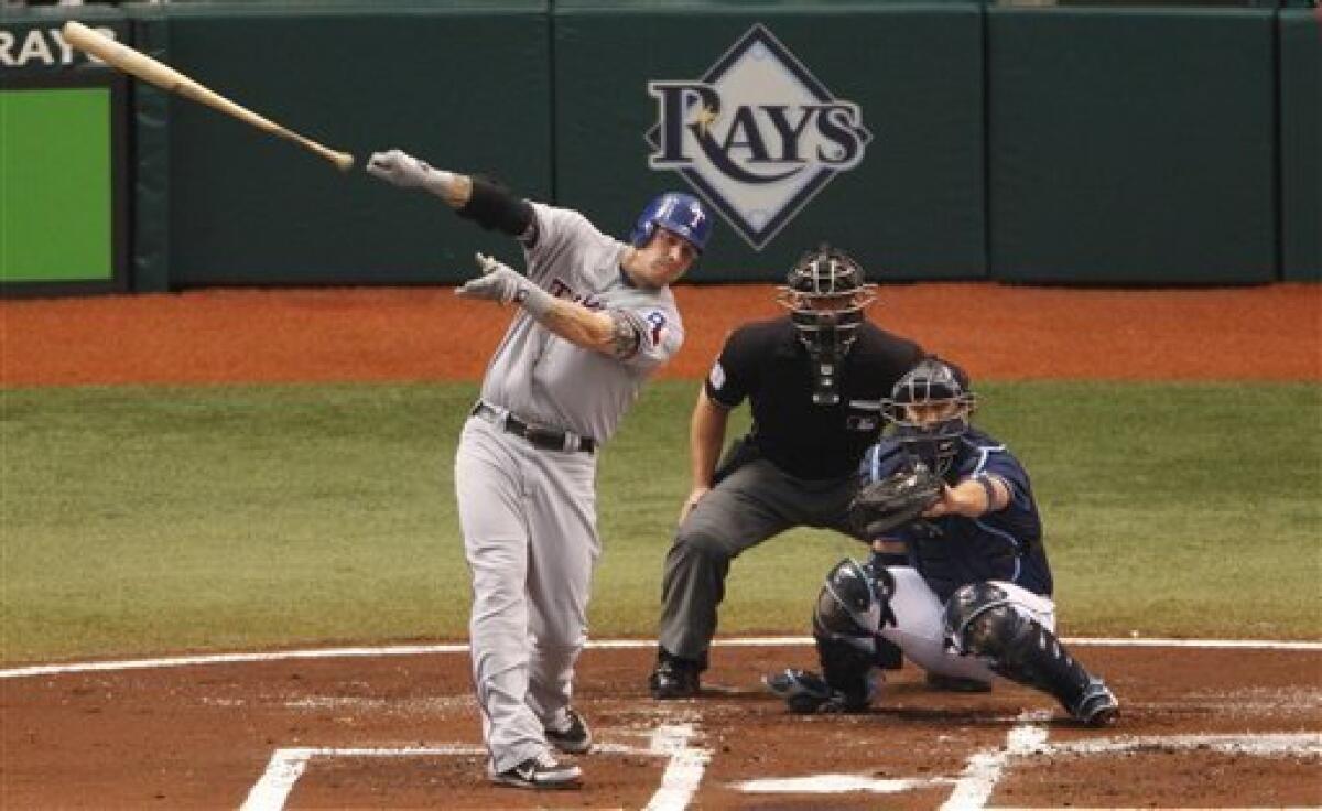 Texas Rangers' Josh Hamilton swings at a pitch in the fifth inning