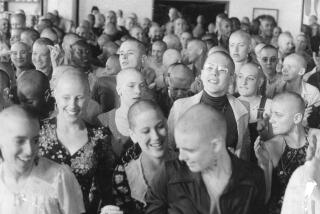 Synanon women shave their head as part of a liberation, February 27, 1975 Photo ran 2/28/1975, p. 1