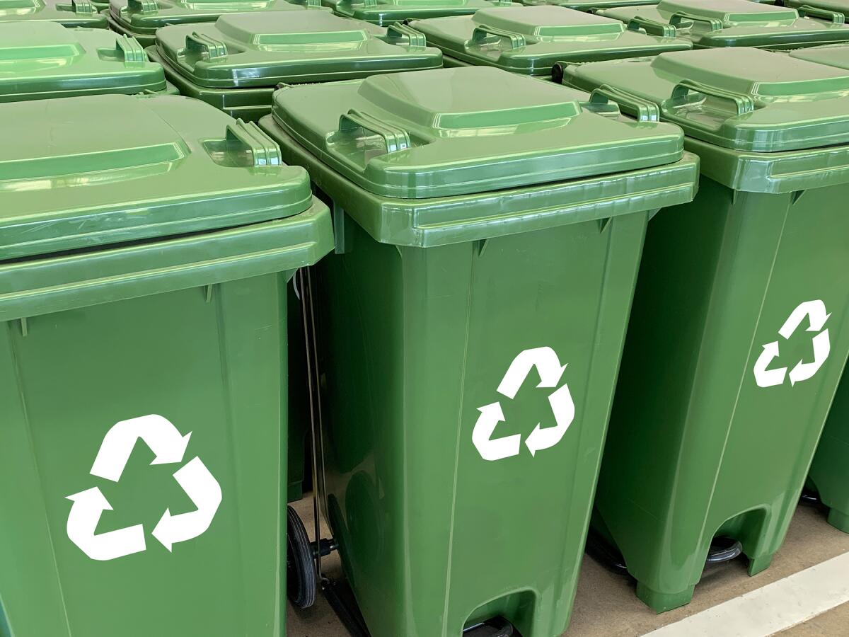 Green recycling bins.