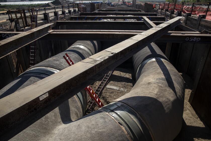 San Jacinto, CA - August 18: A section of aqueduct 148"cement mortar lined welded steel pipe before its connected to 104" earthquake-resistant ductile iron pipe on Colorado River Aqueduct along the five-mile-long Casa Loma Siphon system located at Casa Loma earthquake fault line on Thursday, Aug. 18, 2022 in San Jacinto, CA. (Irfan Khan / Los Angeles Times)