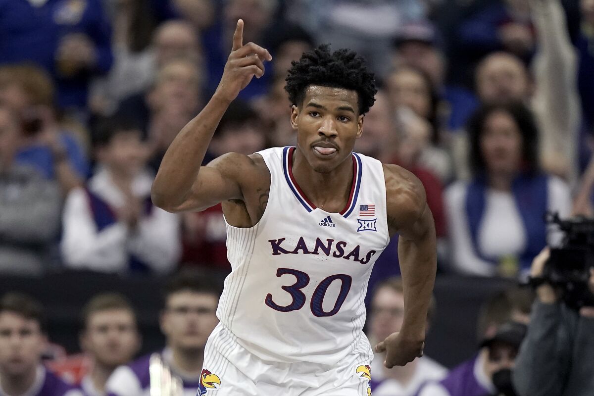 Kansas guard Ochai Agbaji celebrates during a Big 12 Conference tournament semifinal win over Texas Christian on March 11.