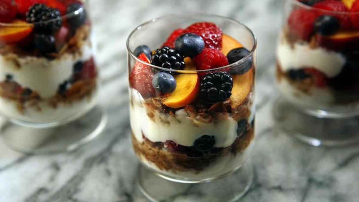 Homemade granola featured in colorful summer parfaits