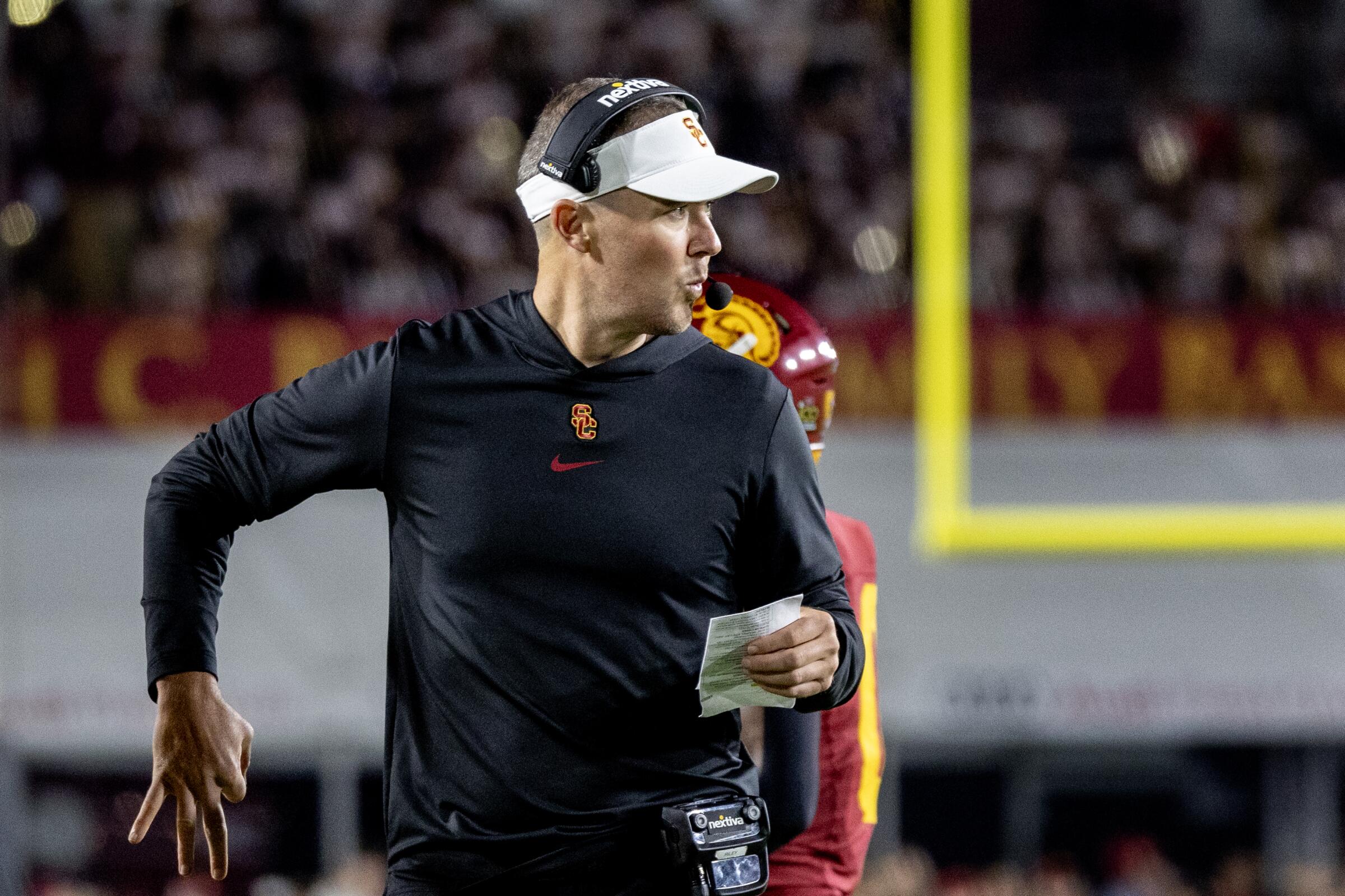 USC coach Lincoln Riley calls a play from the sideline during a win over Arizona on Oct. 7.