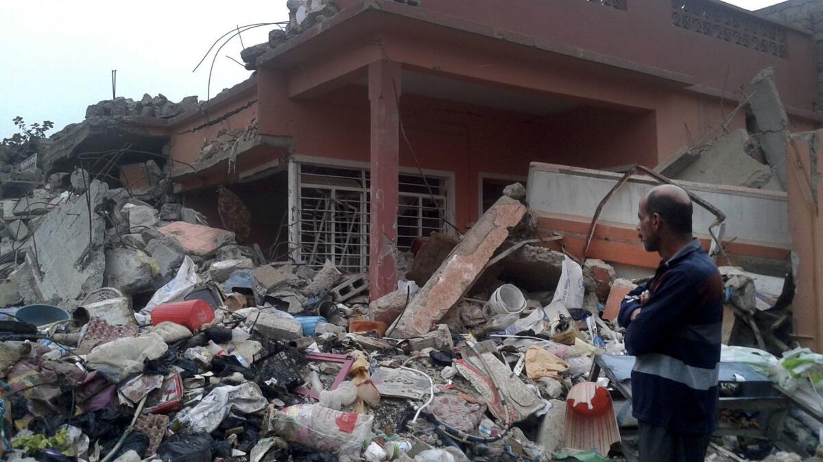 Mohammed Fadhil surveys the site where more than 100 people were killed in a U.S. airstrike on March 17 in west Mosul's Jadidah neighborhood. Fadhil's home was also hit that day, killing his wife of 19 years and three other family members.