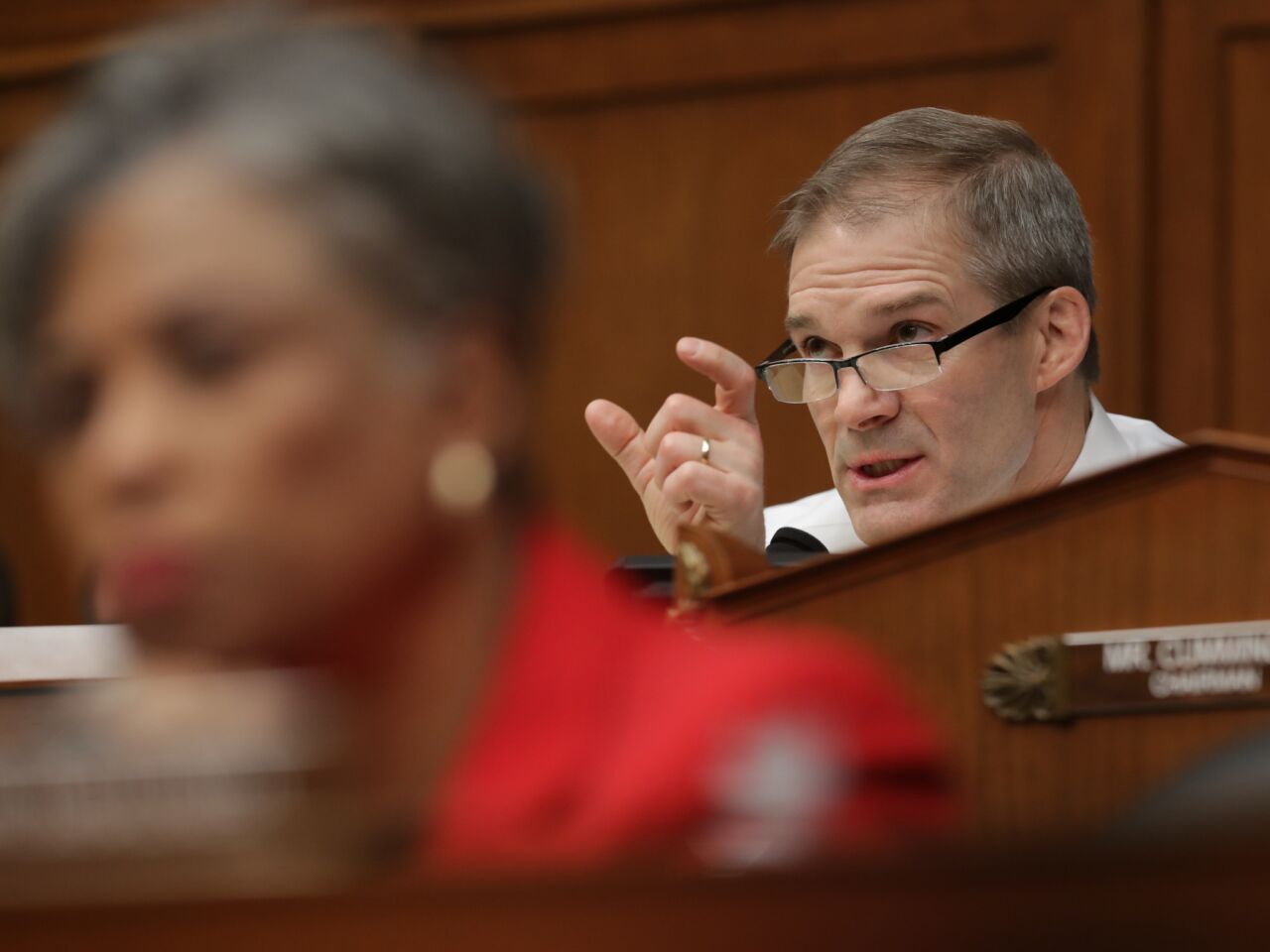 Rep. Jim Jordan (R-OH) questions Michael Cohen as he testifies before the House Oversight Committee on Capitol Hill in Washington, DC.