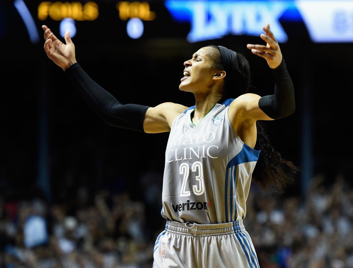 Minnesota Lynx forward Maya Moore tries to rev up the crowd during Game 5 of the 2017 WNBA Finals against the Sparks.