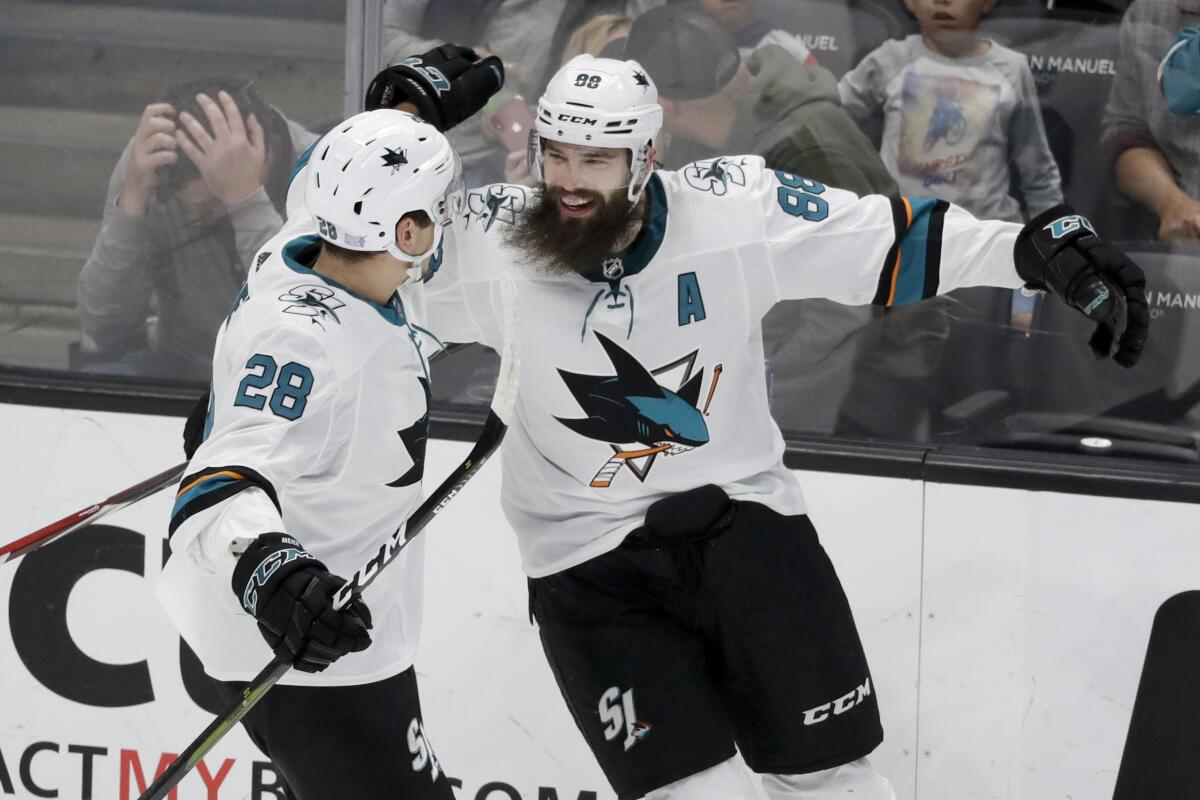 Sharks defenseman Brent Burns celebrates a goal with Timo Meier during the third period of a game Nov. 14 against the Ducks at Honda Center.