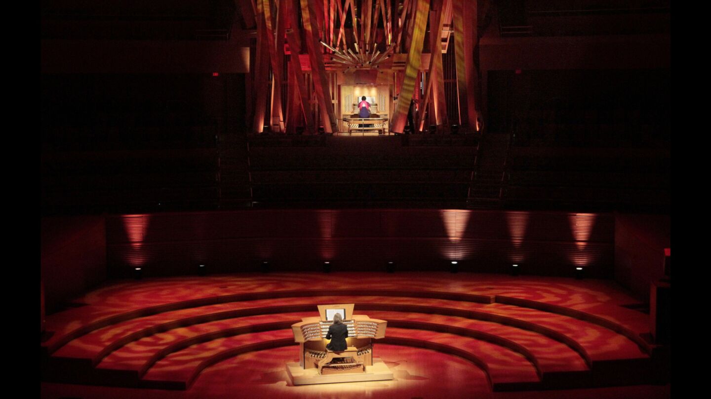 Chelsea Chen, top, and Christoph Bull perform together at Walt Disney Concert Hall. They were part of a nine-organist celebration Nov. 23 that capped off the "Happy Birthday Hurricane Mama" festivities marking the 10th anniversary of the impressive instrument.