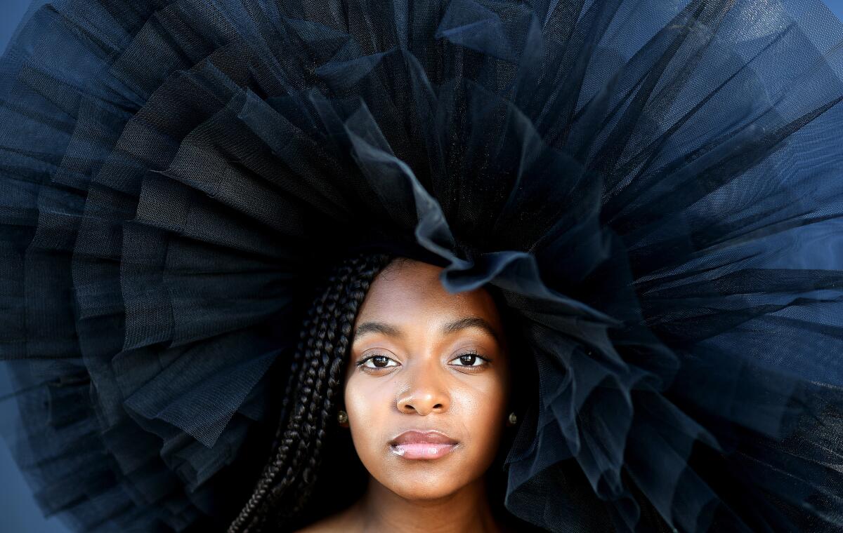 Student Arianna Carson, surrounded by a halo of black tulle, photographed near home in Rowland Heights.