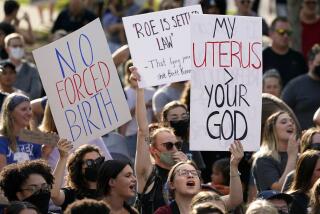 FILE - Abortion-rights protesters attend a rally, June 24, 2022, in Des Moines, Iowa. Iowa’s strict abortion law will take effect Monday, July 29, 2024, banning most abortions after about six weeks of pregnancy and before many women know they are pregnant. (AP Photo/Charlie Neibergall, File)