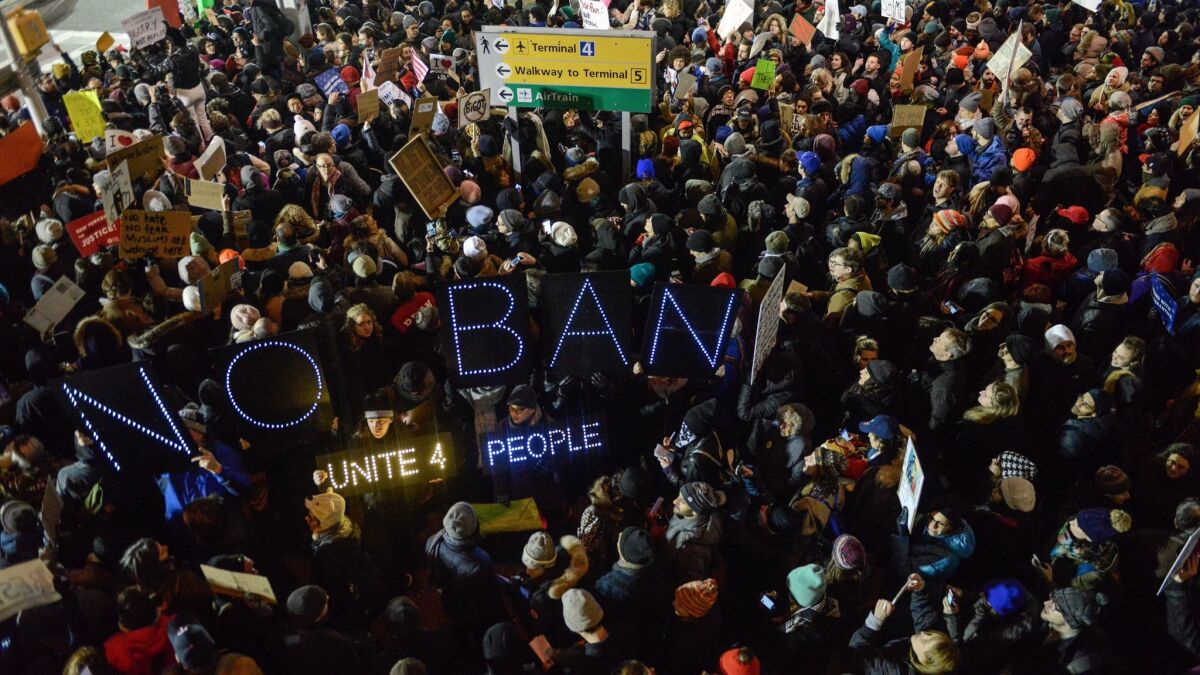 Protesters demonstrate against the Trump administration's refugee and immigration orders at John F. Kennedy International Airport on Jan. 28 in New York City.