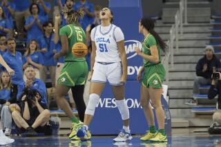 UCLA center Lauren Betts reacts after drawing a foul call against Oregon at Pauley Pavilion.